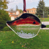Brid sun catcher with vibrant red colours.