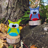 Fused glass owl collection on birch.